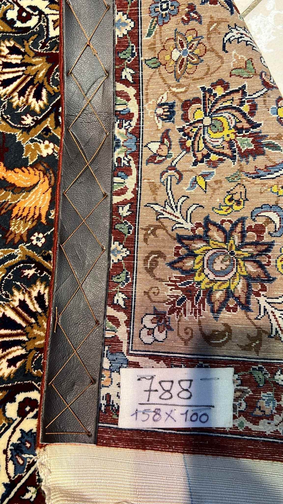 "Backside of a hand-knotted Seirafian Persian rug, revealing the intricate silk warp and craftsmanship by Master Hassan Seirafian."